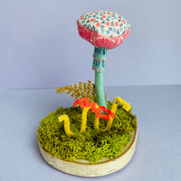 Springtime Folk Plush Mushroom with Inchworm. Decorative item, 3.5" tall. Made in Minneapolis by Heather Donohue